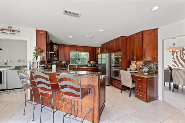 a large kitchen with lots of counter top space