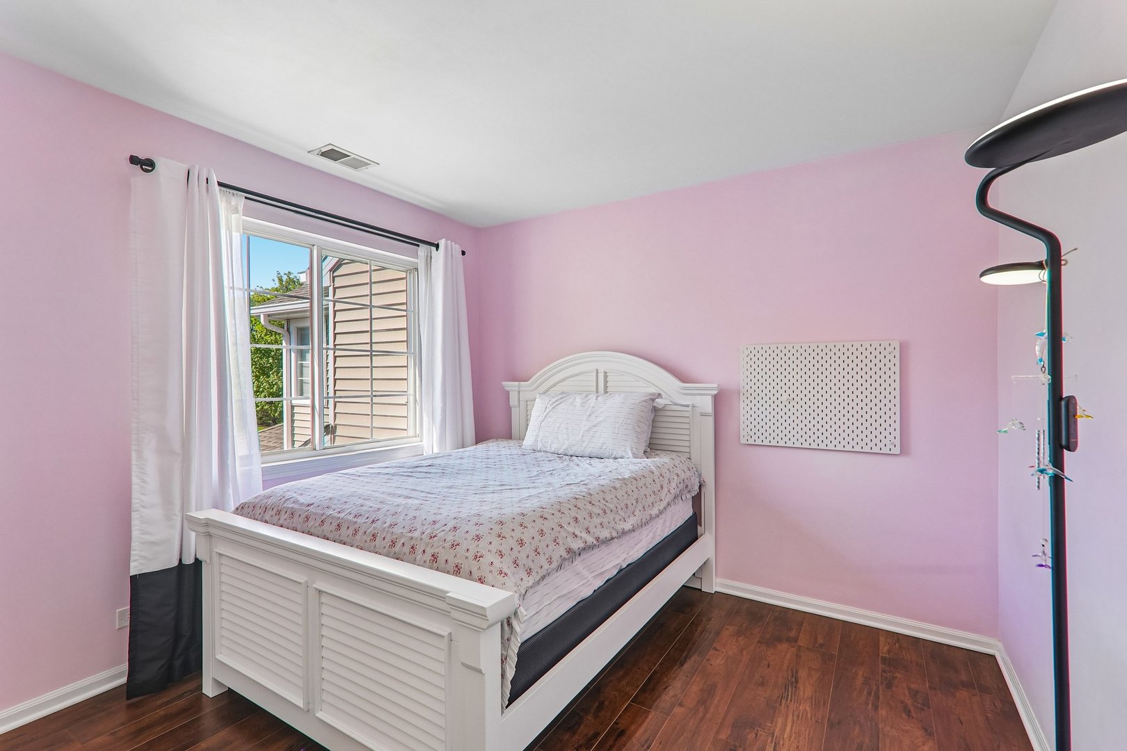1064 Ripple Ridge Darien, IL 60561 - Photo 9 of 16 a bedroom with a bed and a window