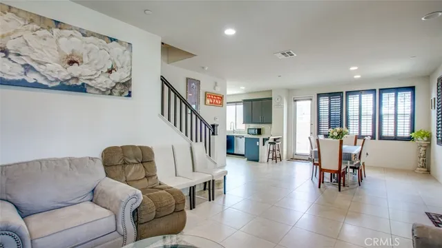 a view of a livingroom with furniture and window