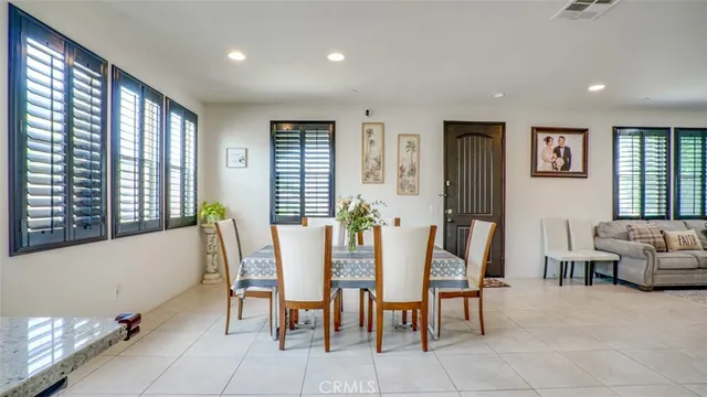 a kitchen with granite countertop a sink and a window