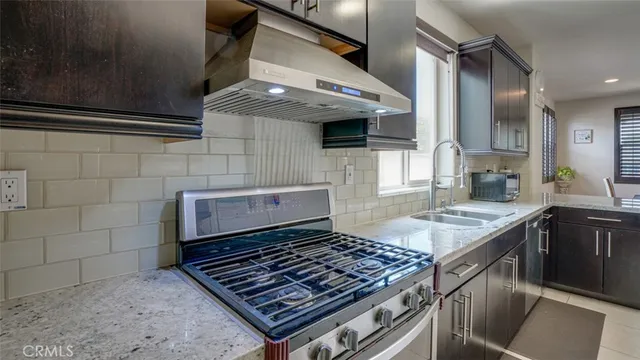 a view of entryway and hall with dining room