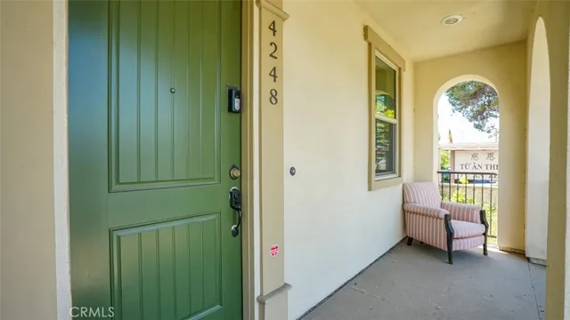 a view of a livingroom with furniture and windows