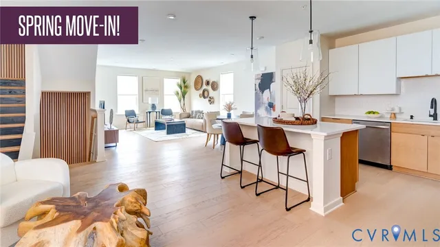a view of a kitchen and dining room