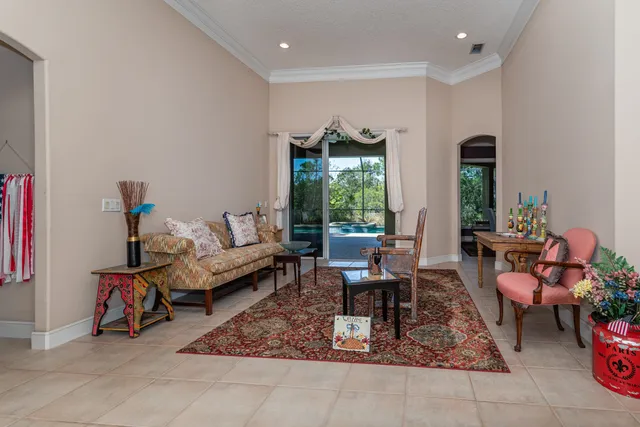 a living room with furniture and a gate
