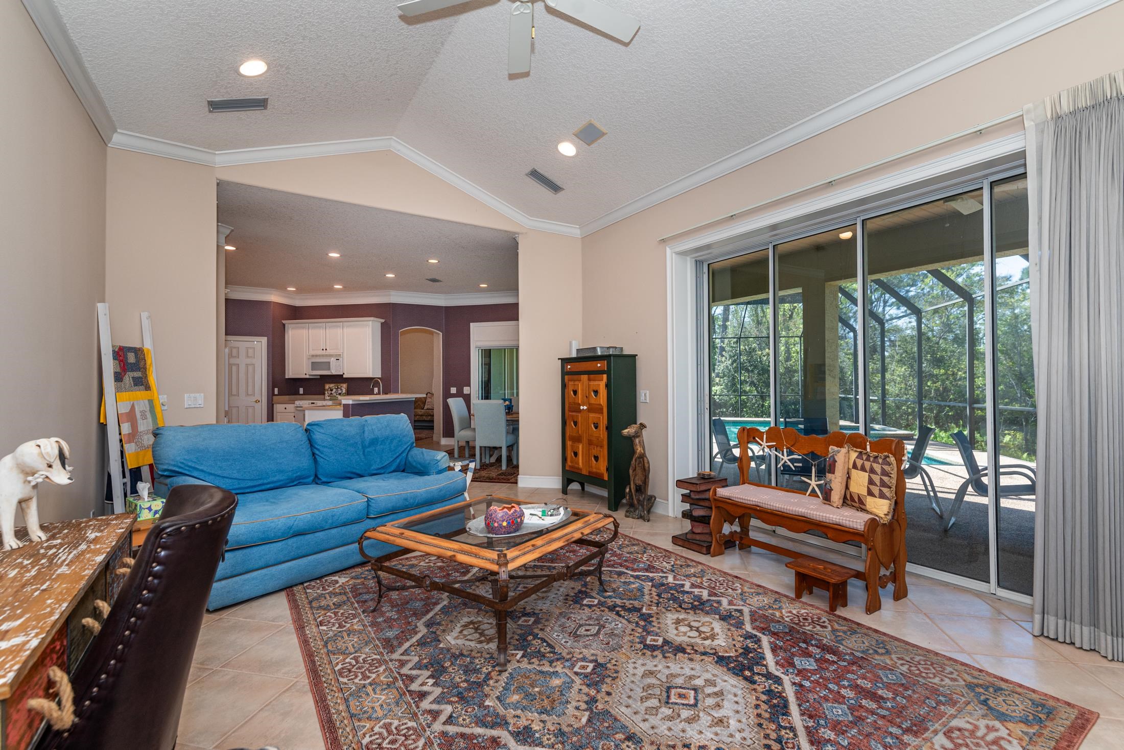 239 Marshside Drive St. Augustine, FL 32080 - Photo 28 of 57 a living room with furniture and a rug