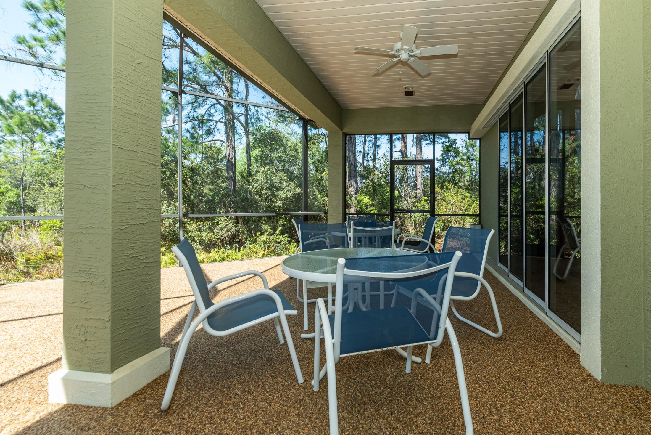 239 Marshside Drive St. Augustine, FL 32080 - Photo 30 of 57 a view of a dining room with furniture window and outside view