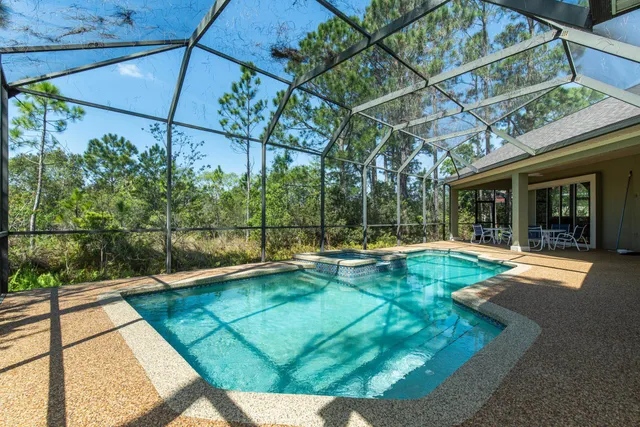 a view of a workspace with bookshelf