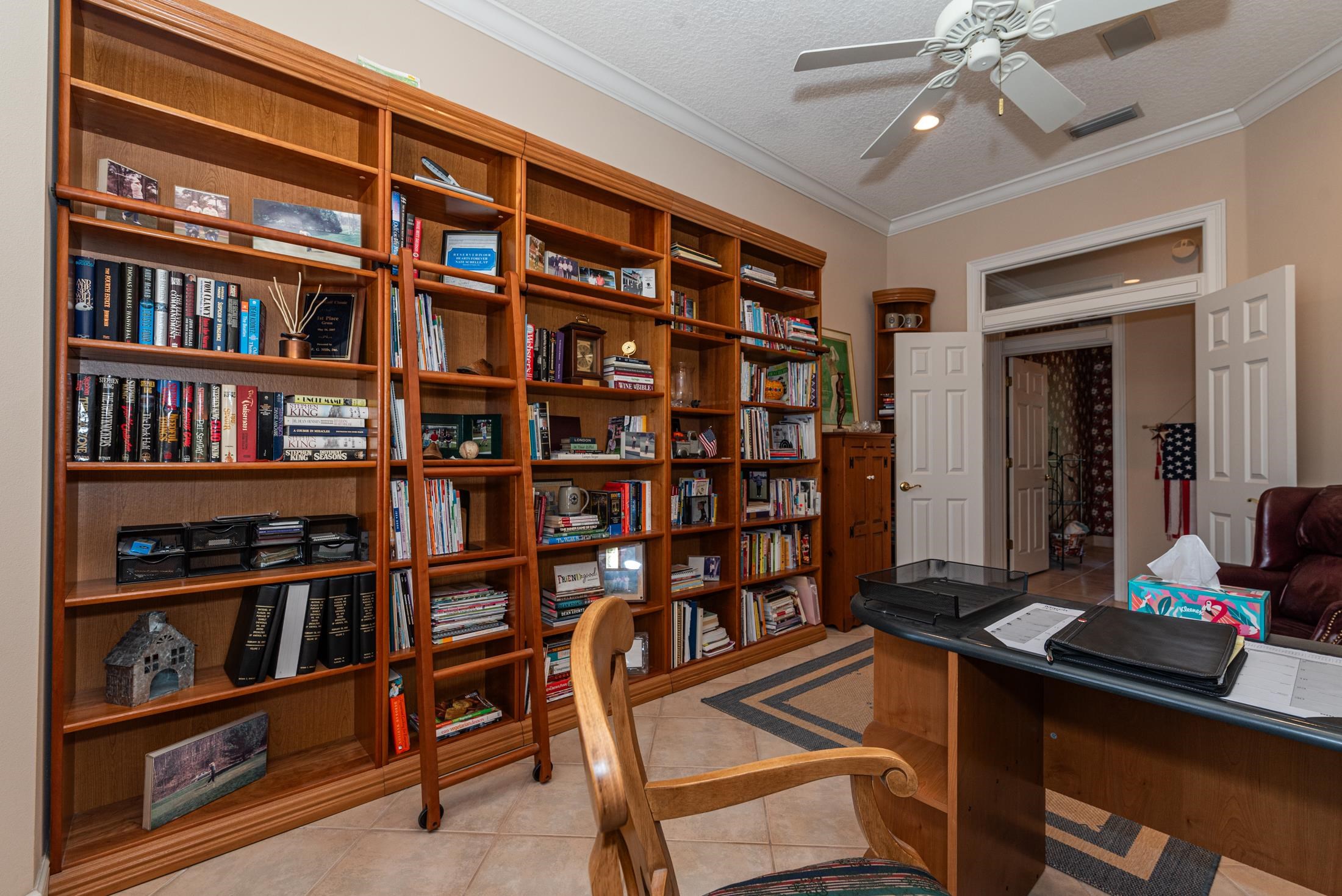 239 Marshside Drive St. Augustine, FL 32080 - Photo 39 of 57 a view of a workspace with bookshelf