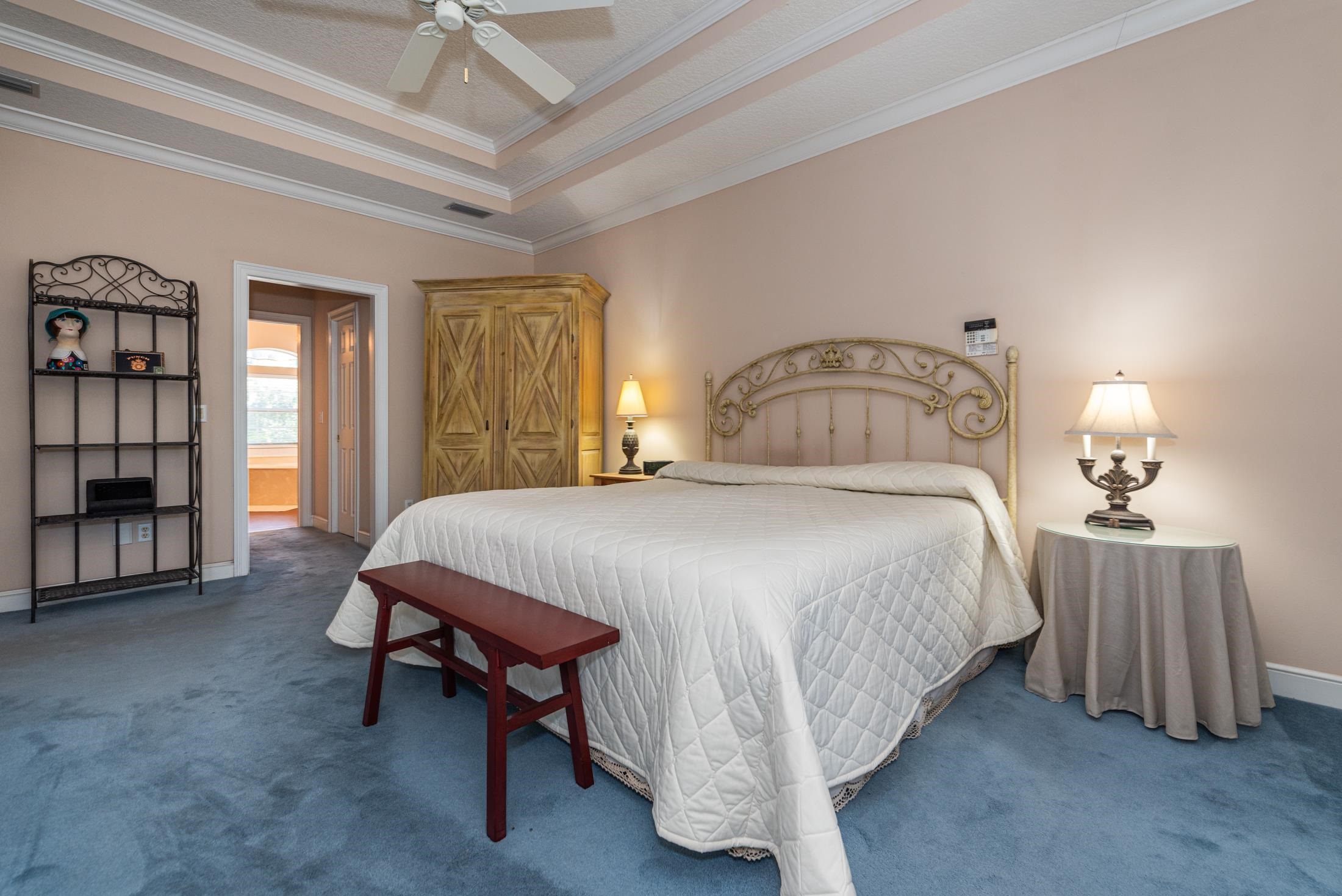 239 Marshside Drive St. Augustine, FL 32080 - Photo 43 of 57 a bedroom with a bed and a table