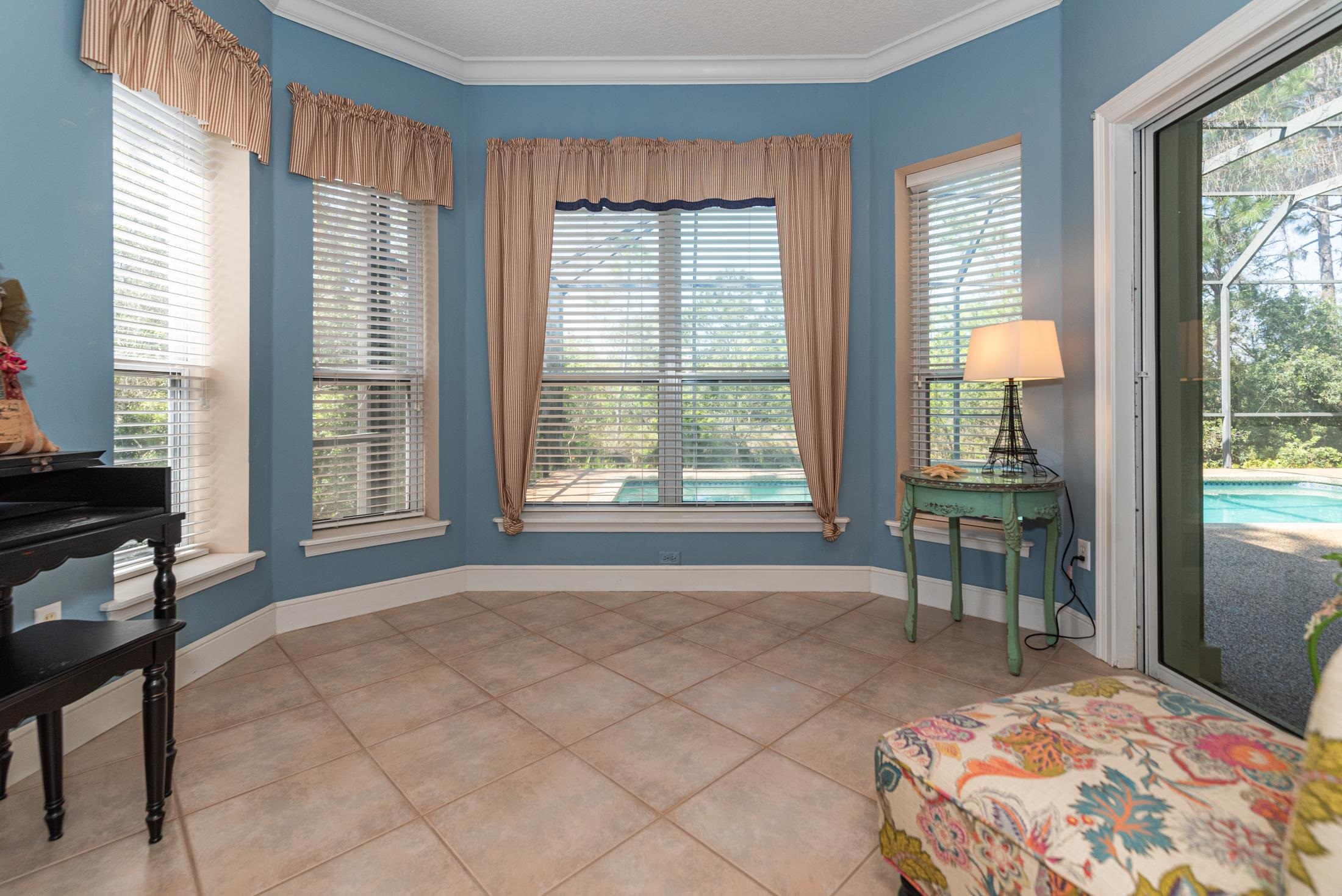 239 Marshside Drive St. Augustine, FL 32080 - Photo 44 of 57 a spacious bedroom with a bed and a window