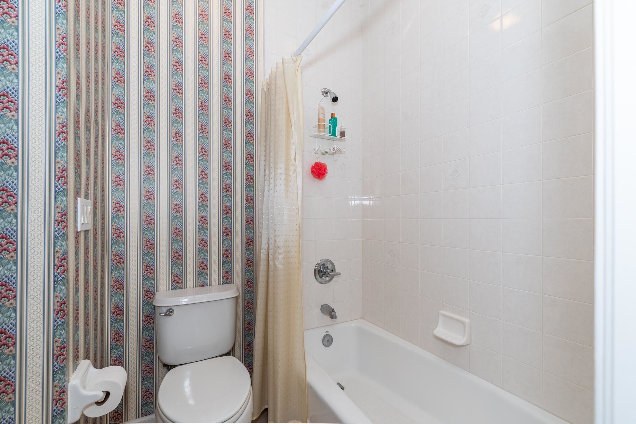 239 Marshside Drive St. Augustine, FL 32080 - Photo 53 of 57 a white toilet sitting next to a bath tub