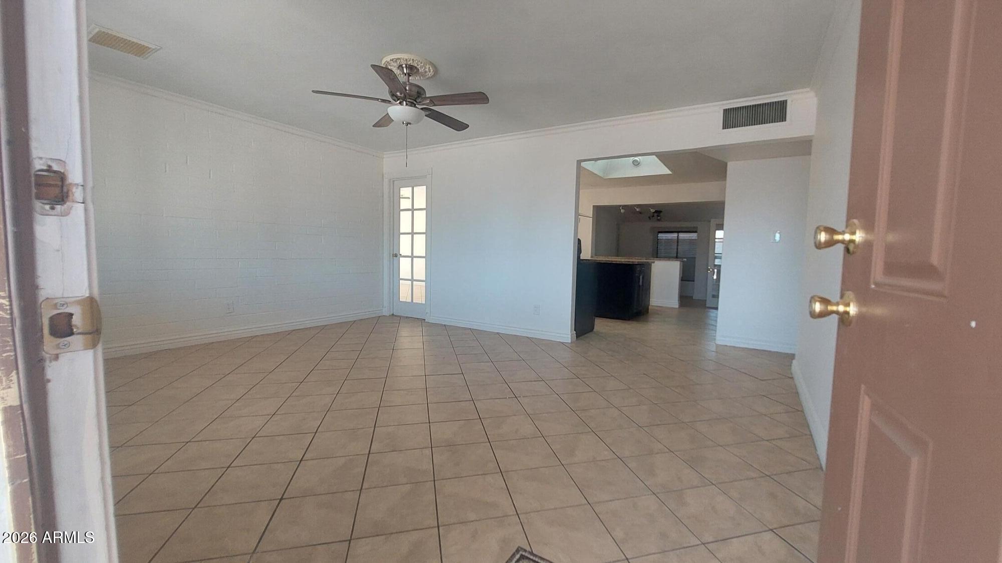 2448 West Freeway Lane Phoenix, AZ 85021 - Photo 3 of 27 a view of an empty room and a window
