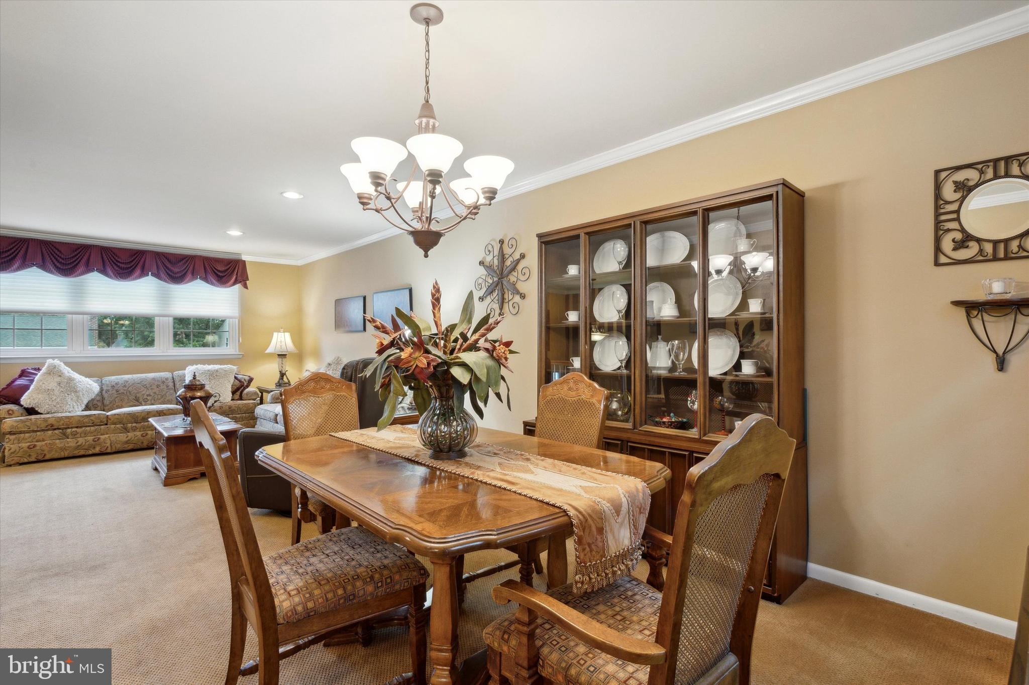 512 Schick Road Aston, PA 19014 - Photo 7 of 25 a view of a dining room with furniture and chandelier