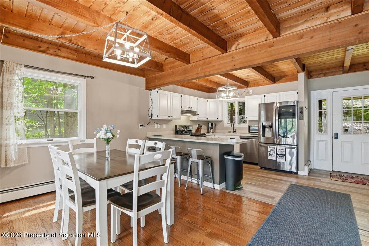 10 Knollwood Road Lake Ariel, PA 18436 - Photo 14 of 60 a view of a dining room with furniture window and outside view