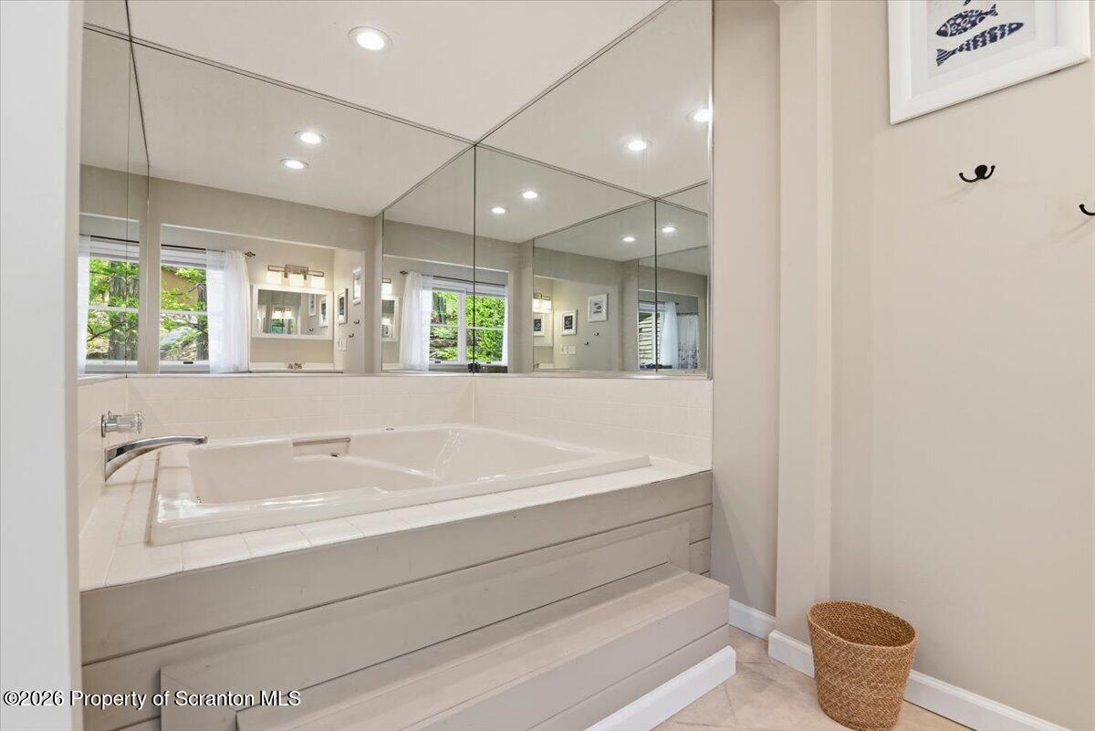 10 Knollwood Road Lake Ariel, PA 18436 - Photo 33 of 60 a spacious bathroom with a bathtub and sink