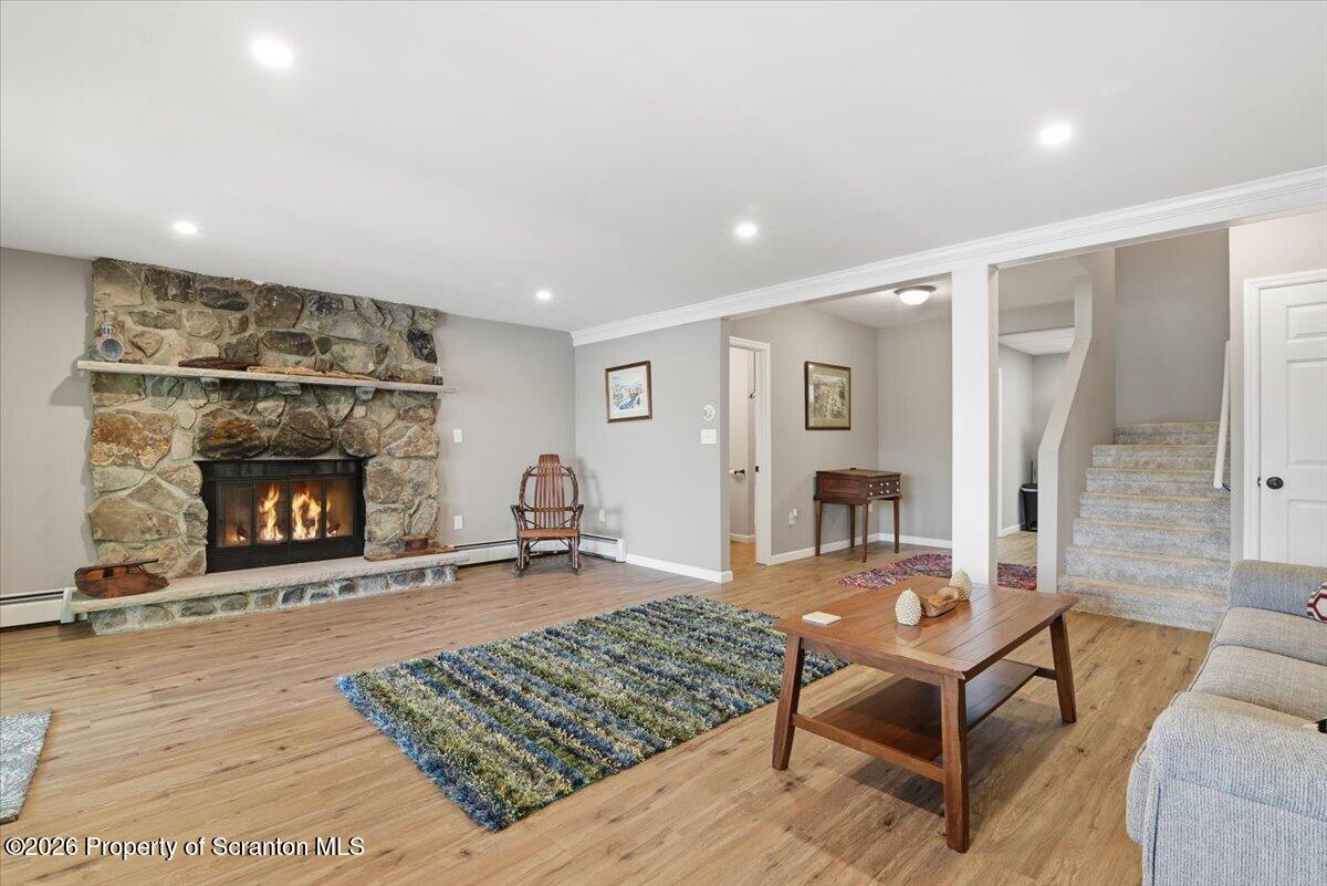 10 Knollwood Road Lake Ariel, PA 18436 - Photo 37 of 60 a living room with furniture and a fireplace