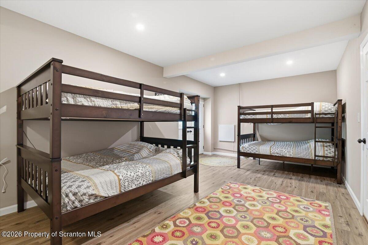 10 Knollwood Road Lake Ariel, PA 18436 - Photo 42 of 60 a bedroom with a bed and a mirror