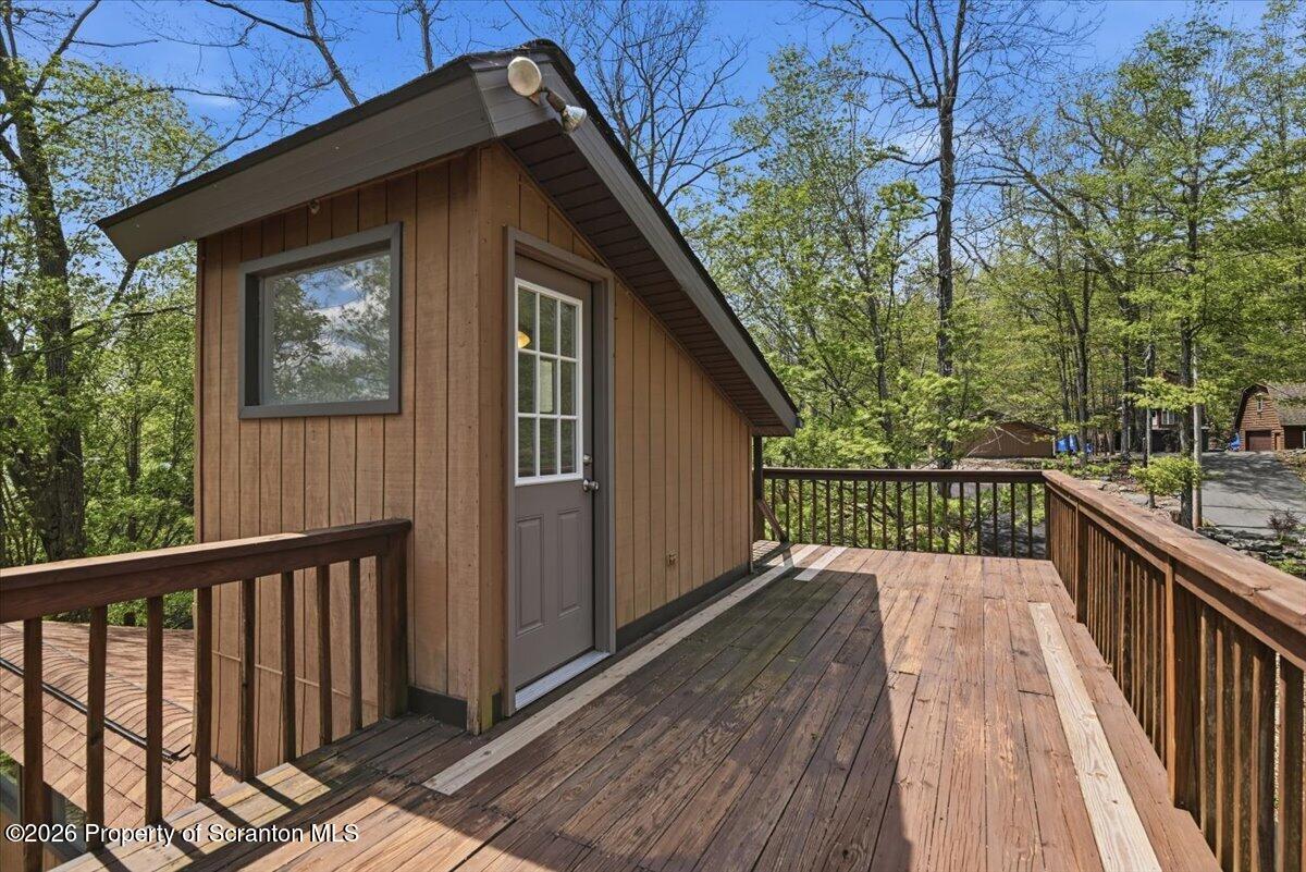 10 Knollwood Road Lake Ariel, PA 18436 - Photo 47 of 60 a view of a wooden deck and a yard