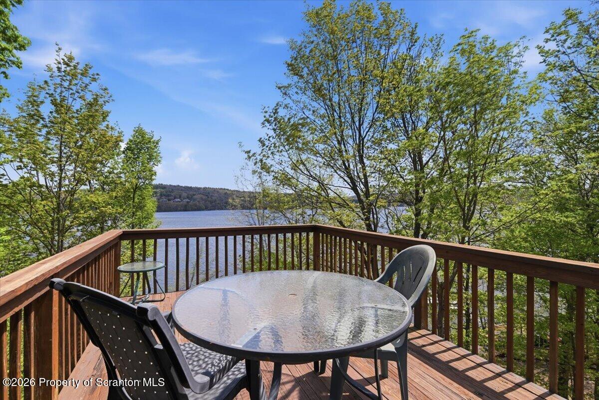 10 Knollwood Road Lake Ariel, PA 18436 - Photo 48 of 60 a view of balcony with wooden fence and trees