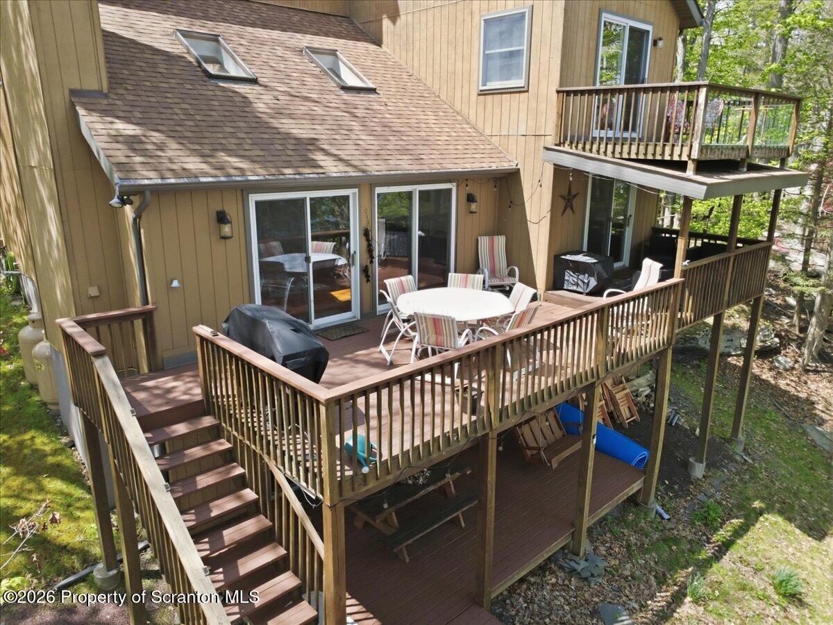 10 Knollwood Road Lake Ariel, PA 18436 - Photo 50 of 60 a view of a house with a deck and furniture
