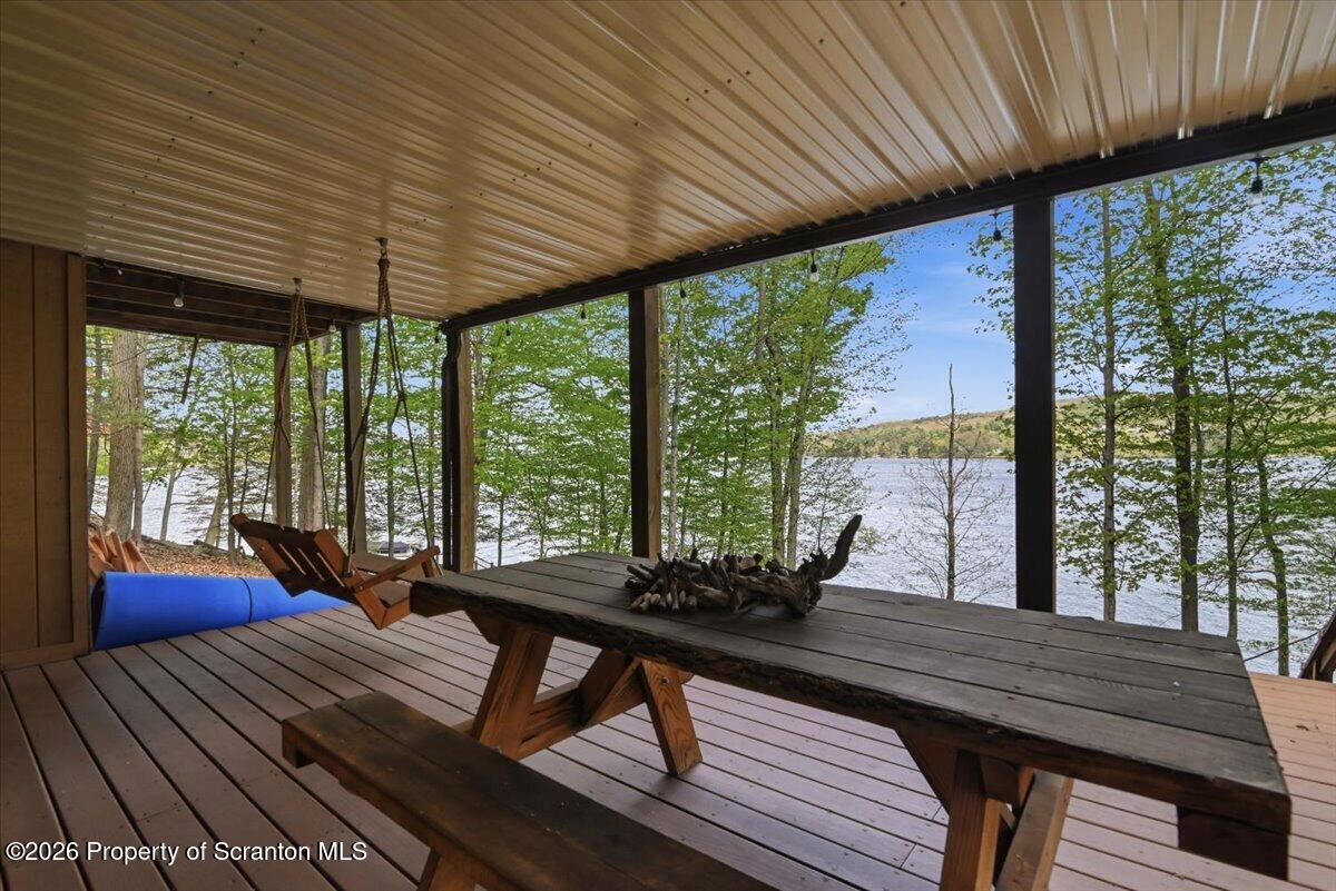 10 Knollwood Road Lake Ariel, PA 18436 - Photo 54 of 60 a view of a patio with a table chairs and a backyard