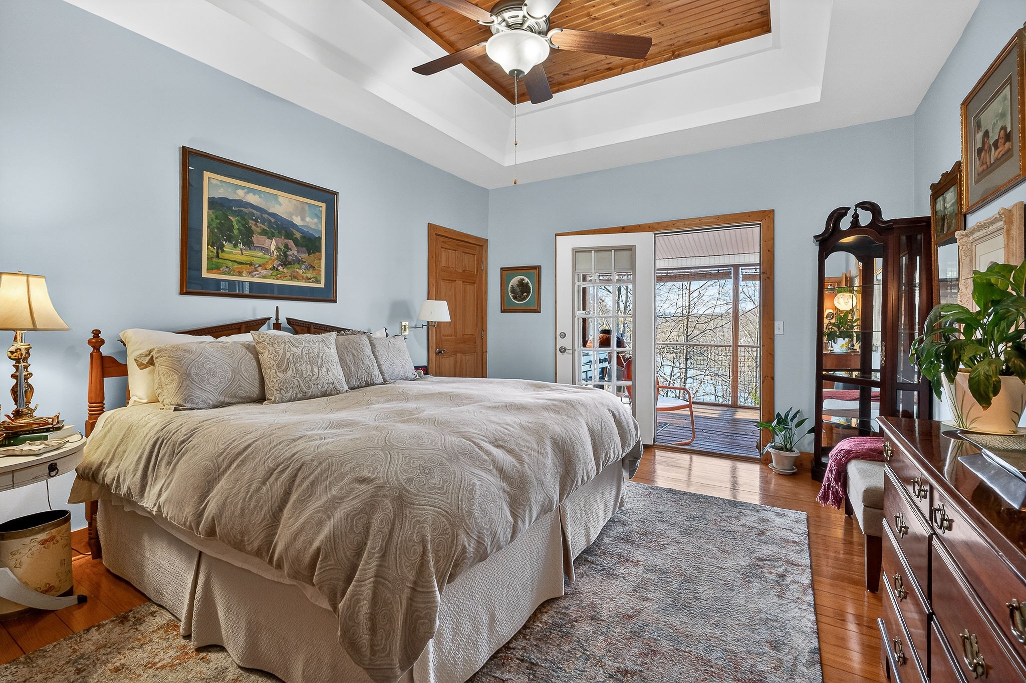 2539 Sparkman Town Road Doyle, TN 38559 - Photo 18 of 54 a spacious bedroom with a bed a dresser and a chandelier