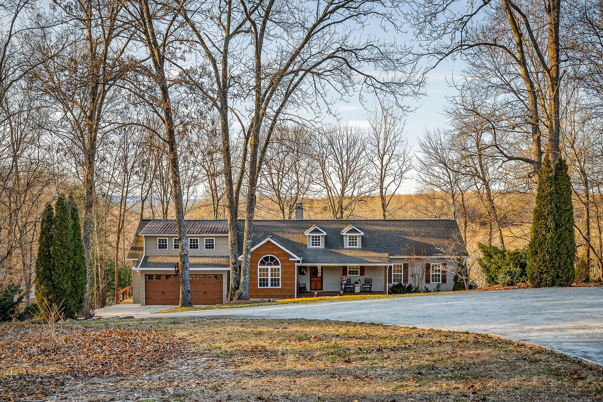 2539 Sparkman Town Road Doyle, TN 38559 - Photo 3 of 54 a front view of a house with a yard and large trees