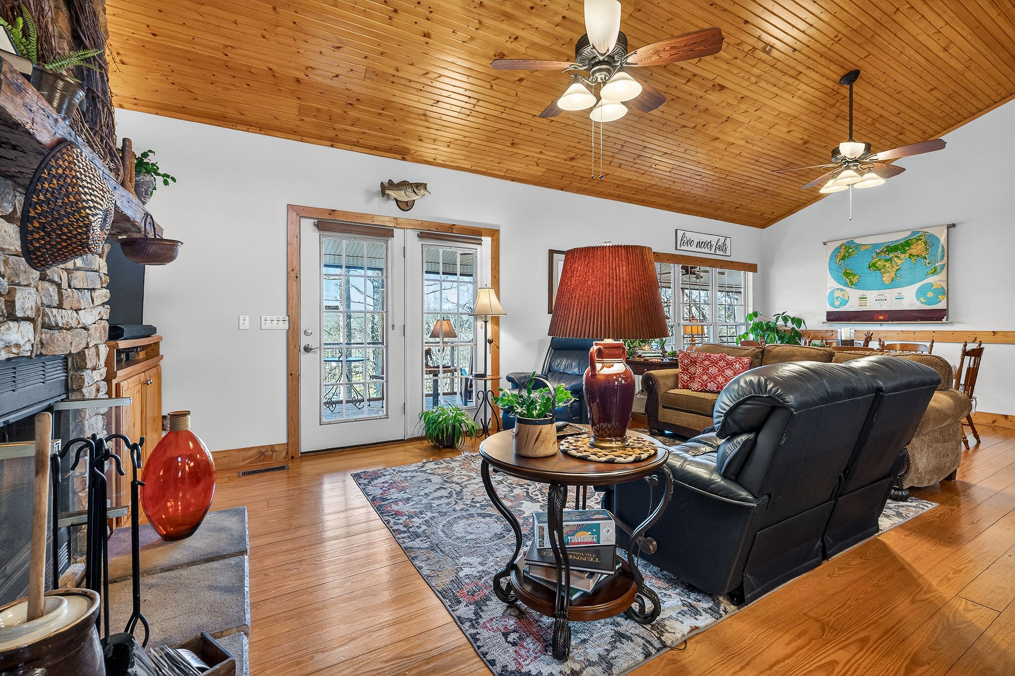 2539 Sparkman Town Road Doyle, TN 38559 - Photo 7 of 54 a living room with furniture a rug and a chandelier