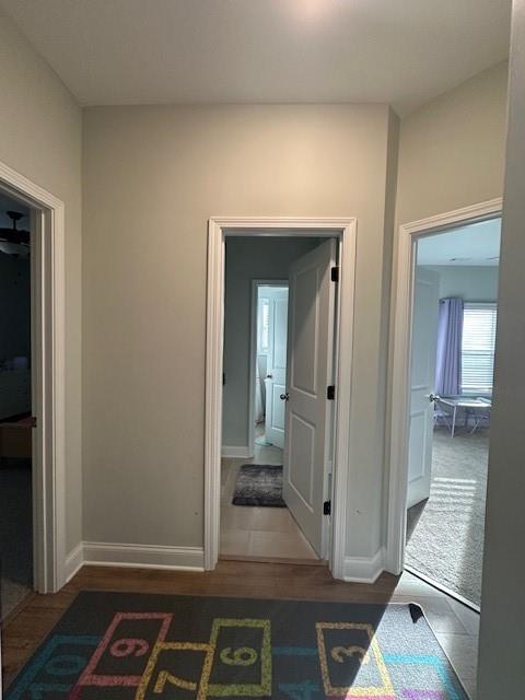 3156 Sweetbriar Drive Villa Rica, GA 30180 - Photo 16 of 39 a view of a hallway with wooden floor and dining room