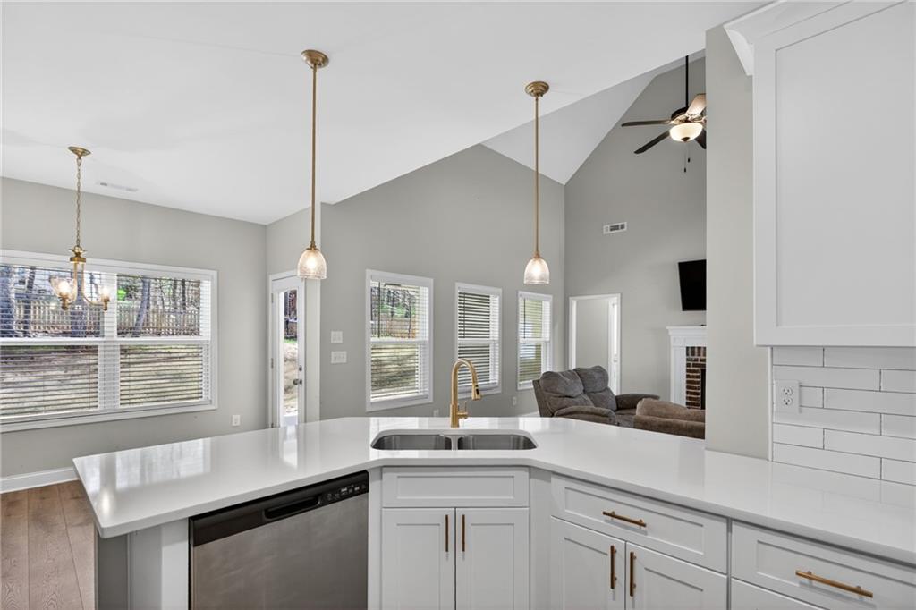 3156 Sweetbriar Drive Villa Rica, GA 30180 - Photo 18 of 45 a kitchen with sink cabinets and window