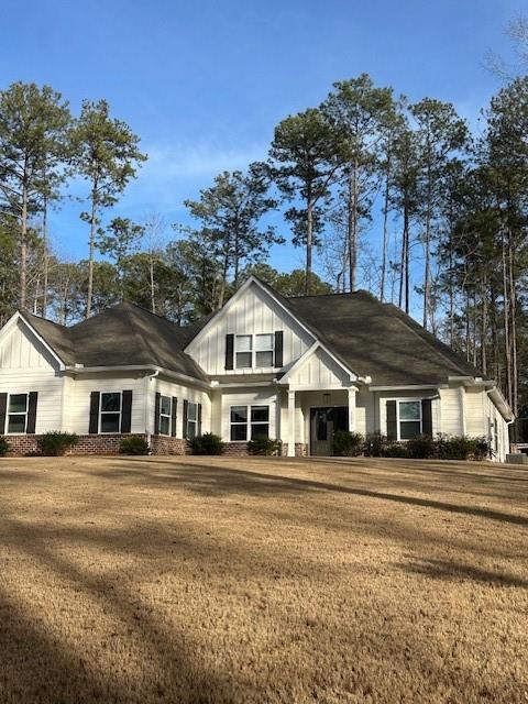 3156 Sweetbriar Drive Villa Rica, GA 30180 - Photo 2 of 39 a front view of a house with a garden