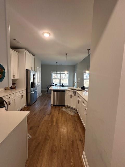 3156 Sweetbriar Drive Villa Rica, GA 30180 - Photo 25 of 39 a large kitchen with a lot of counter space and stainless steel appliances