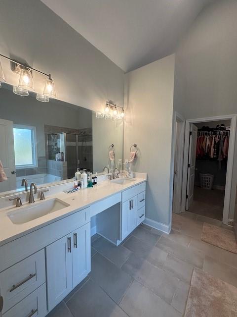 3156 Sweetbriar Drive Villa Rica, GA 30180 - Photo 28 of 39 a spacious bathroom with a double vanity sink a large mirror and a bathtub