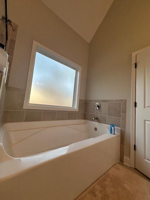 3156 Sweetbriar Drive Villa Rica, GA 30180 - Photo 31 of 39 a bathroom with a bathtub and a shower