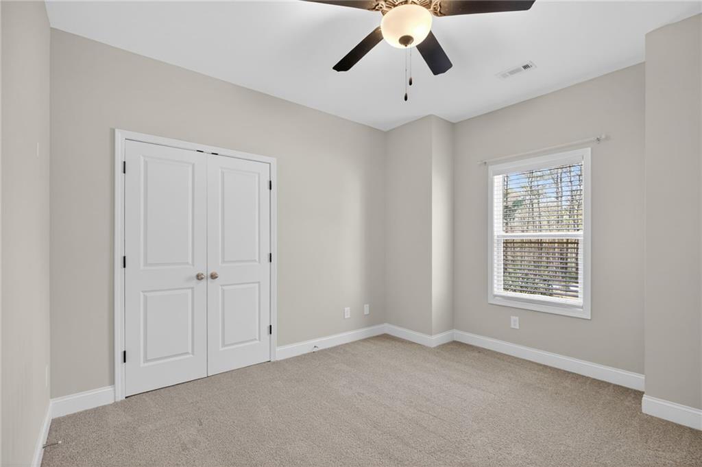 3156 Sweetbriar Drive Villa Rica, GA 30180 - Photo 31 of 45 a view of an empty room with a window