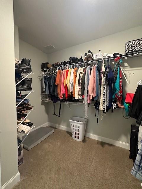 3156 Sweetbriar Drive Villa Rica, GA 30180 - Photo 32 of 39 a view of walk in closet with clothes and shoes
