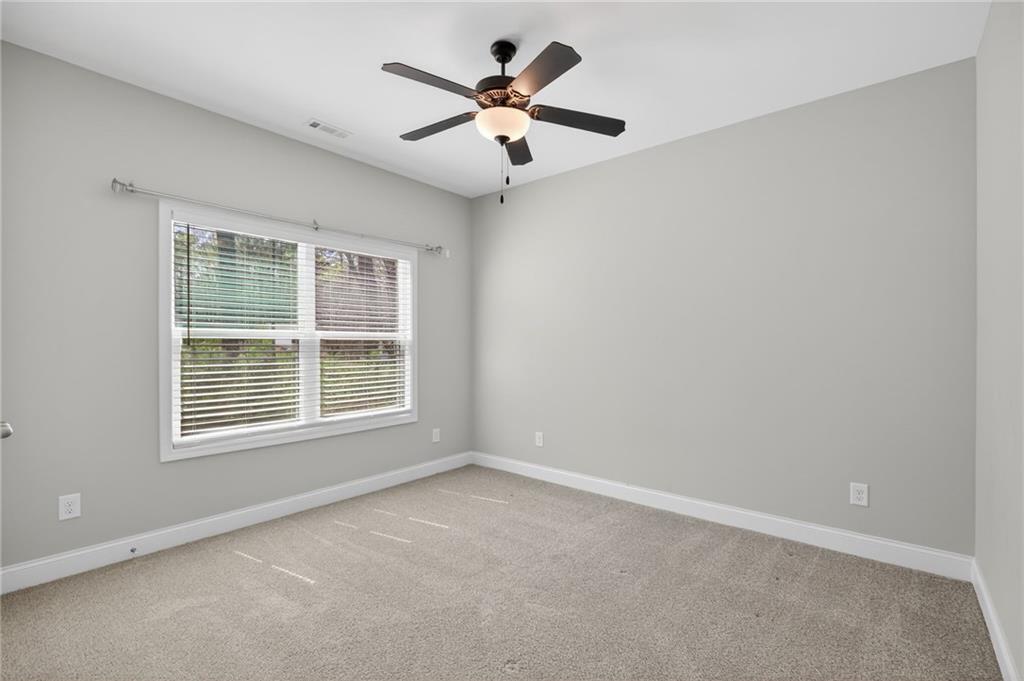 3156 Sweetbriar Drive Villa Rica, GA 30180 - Photo 34 of 45 a view of an empty room with a window