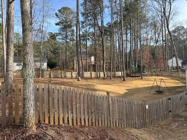 3156 Sweetbriar Drive Villa Rica, GA 30180 - Photo 36 of 39 a view of swimming pool with outdoor seating and trees