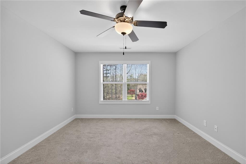3156 Sweetbriar Drive Villa Rica, GA 30180 - Photo 38 of 45 an empty room with a window
