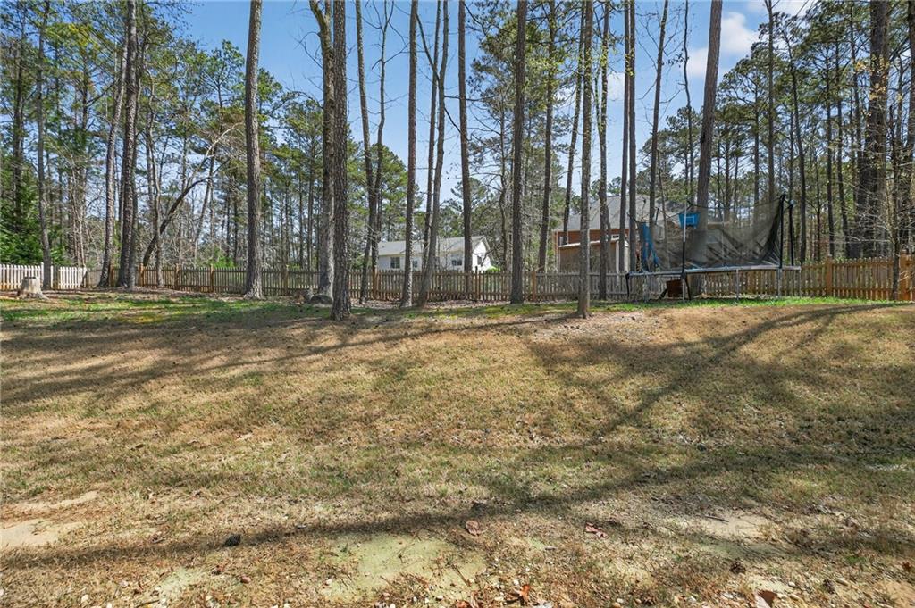 3156 Sweetbriar Drive Villa Rica, GA 30180 - Photo 40 of 45 a view of outdoor space with trees