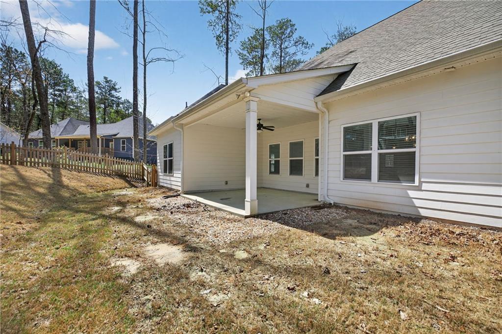 3156 Sweetbriar Drive Villa Rica, GA 30180 - Photo 42 of 45 a view of house with backyard and trees in the background