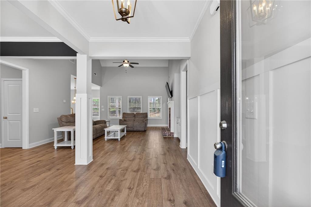 3156 Sweetbriar Drive Villa Rica, GA 30180 - Photo 6 of 45 a view of a living room with furniture and wooden floor