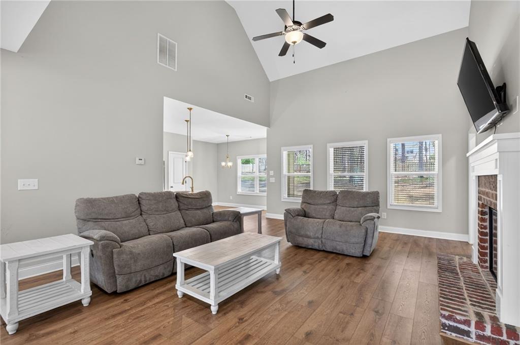 3156 Sweetbriar Drive Villa Rica, GA 30180 - Photo 10 of 45 a living room with furniture and a flat screen tv