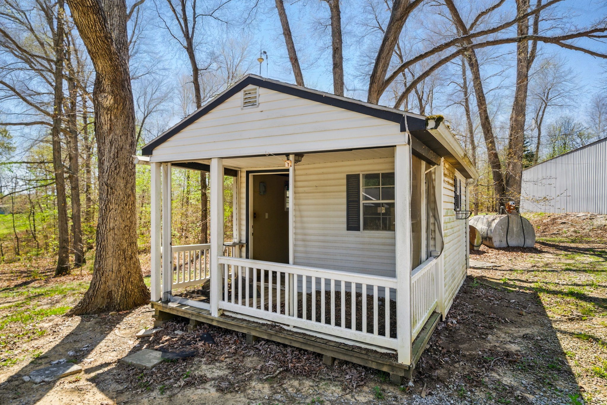 12748 Fruit Hill Red Bridge Road Crofton, KY 42217 - Photo 13 of 29 a porch with seating space