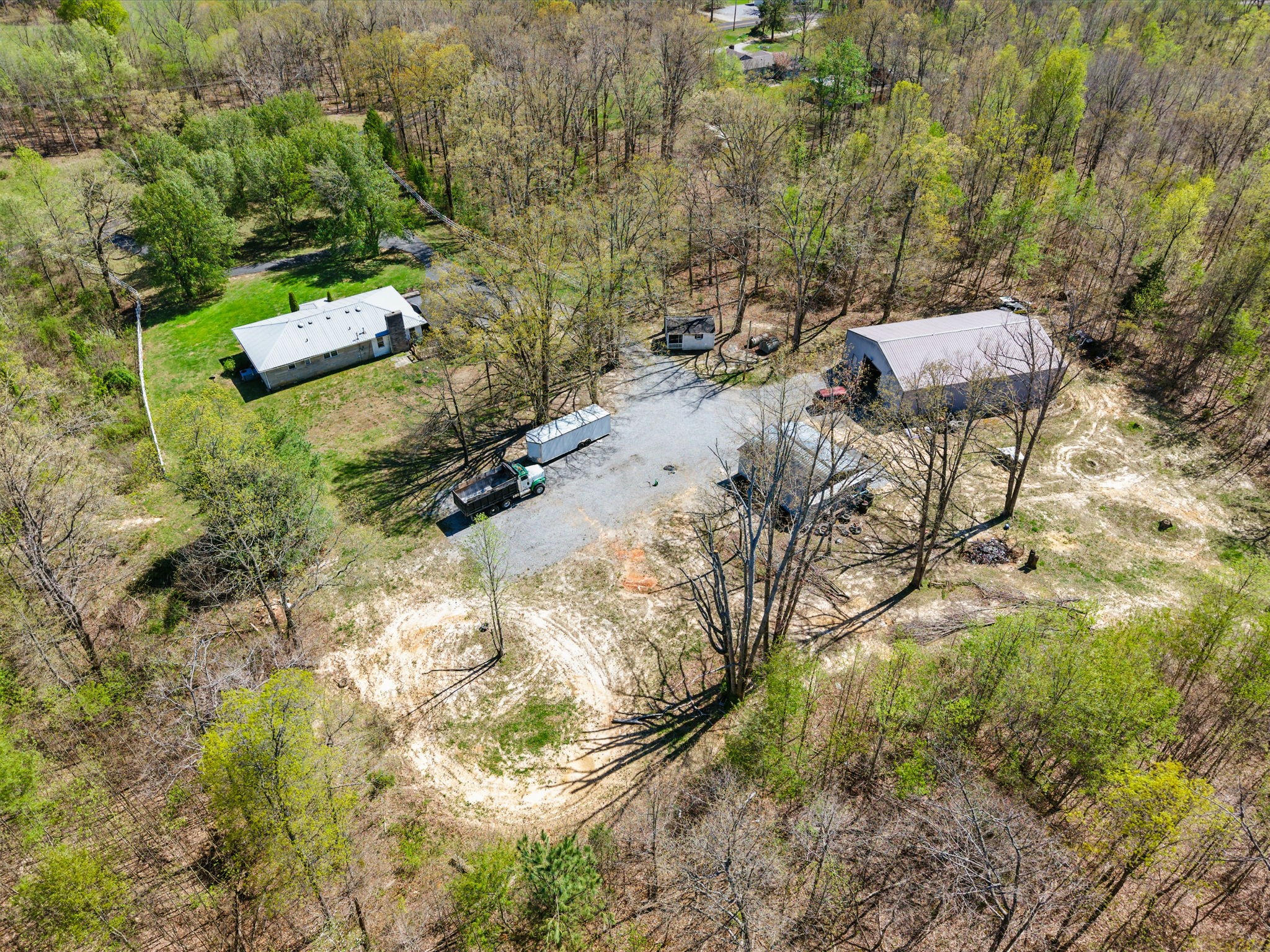 12748 Fruit Hill Red Bridge Road Crofton, KY 42217 - Photo 16 of 29 a view of a yard with plants and large trees