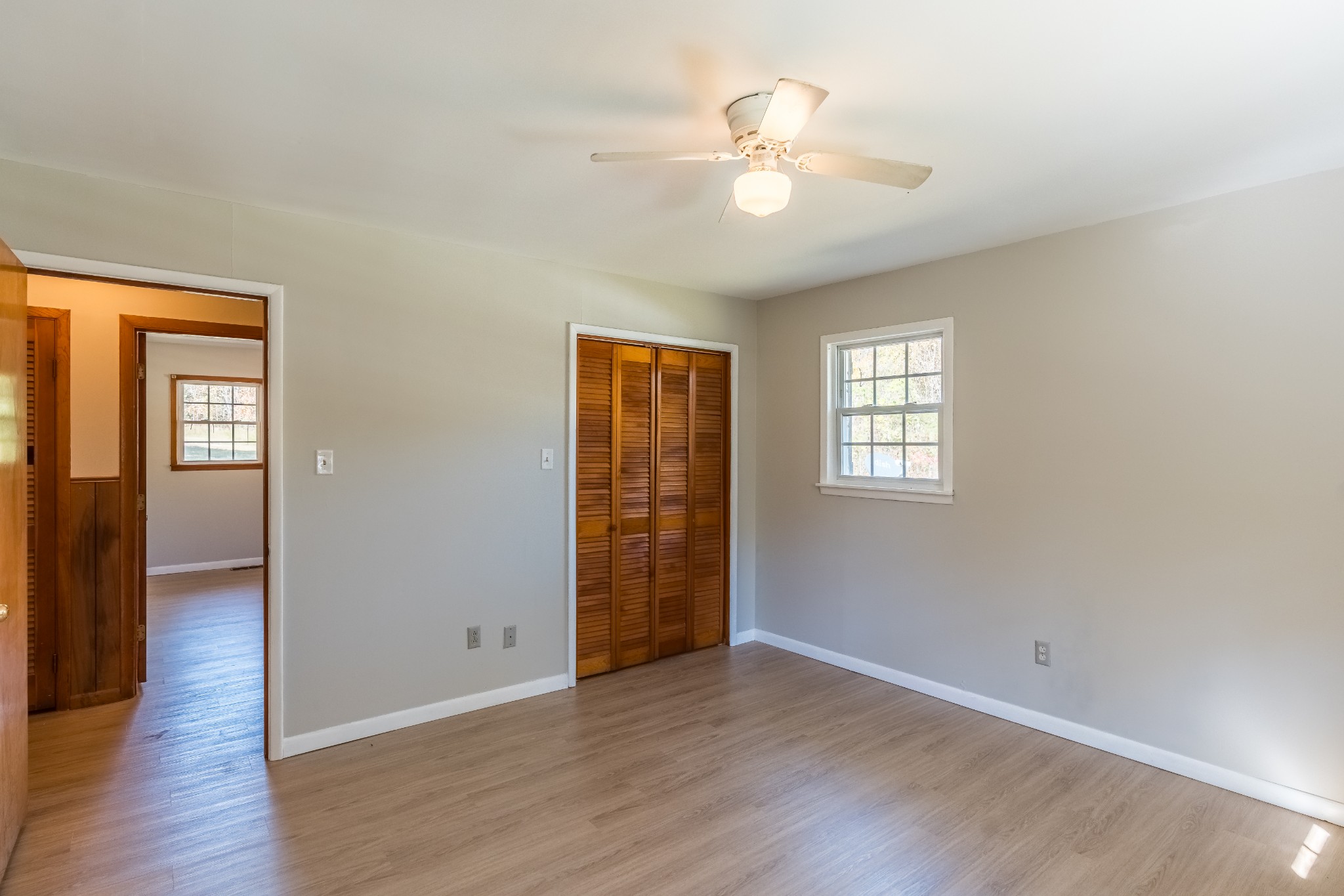 12748 Fruit Hill Red Bridge Road Crofton, KY 42217 - Photo 27 of 29 wooden floor in an empty room with a window