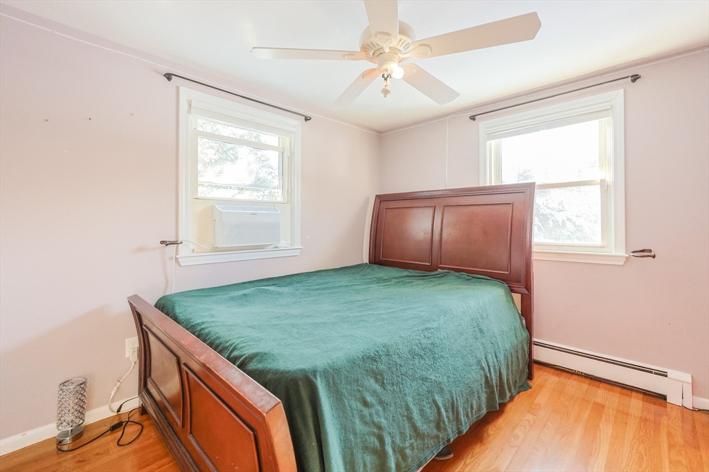 128 Salem Road Billerica, MA 01821 - Photo 27 of 42 a bed room with a bed