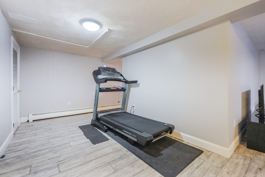 128 Salem Road Billerica, MA 01821 - Photo 37 of 42 a room with gym equipment