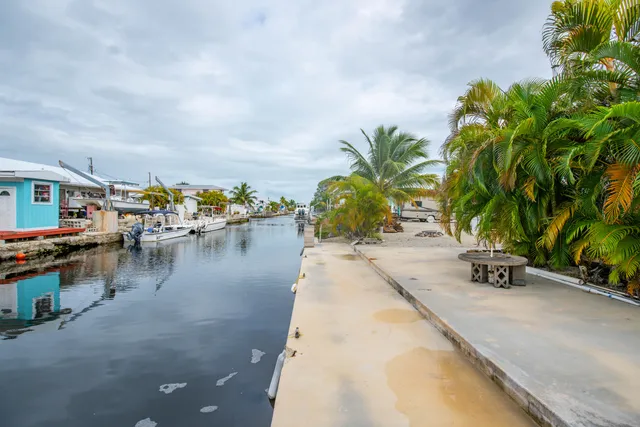 a view of swimming pool with outdoor seating