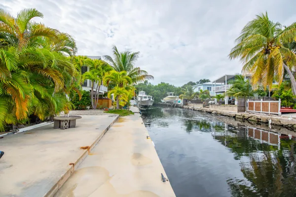 a view of a lake with a building in the background